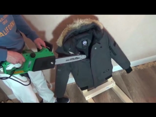 downjacket vs chainsaw.canada goose jacket destruction